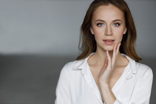 Portrait of a young happy woman indoor. High quality photo