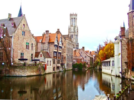 Brugge/Belgium - Autumn. Old town buildings on the canal. Beautiful reflection