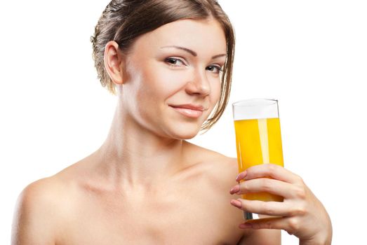 Young beautiful woman drinking orange juice isolated on a white background