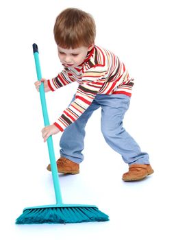 Little boy sweeping the floor. Isolated on white background .