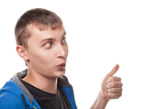 Portrait of a handsome young man, thumbs up over white background