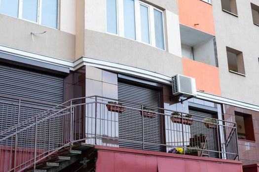 Window with modern shutter, exterior shot.