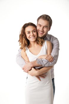 Portrait of happy couple isolated on white background. Attractive man and woman being playful.