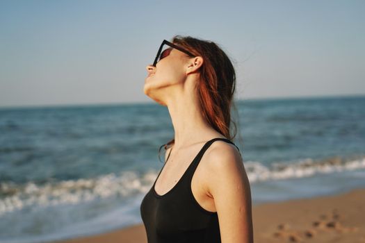 pretty woman on the beach summer vacation lifestyle sun. High quality photo