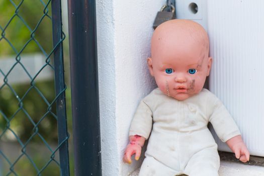 Homeless children, orphans and child abuse - Broken and macabre dolls