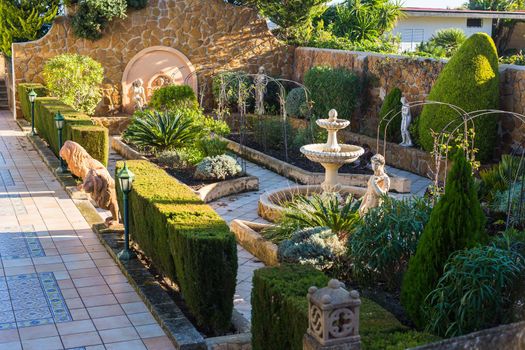 Fountain and beautiful sculptures in the courtyard.