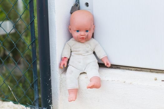 Homeless children, orphans and child abuse - Broken and macabre dolls
