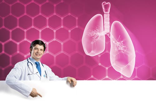 Young handsome doctor holding white blank banner. Place your text