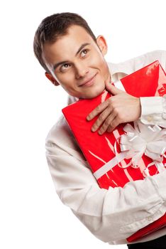 Close-up portrait of smiling man holding gift isolated on white background