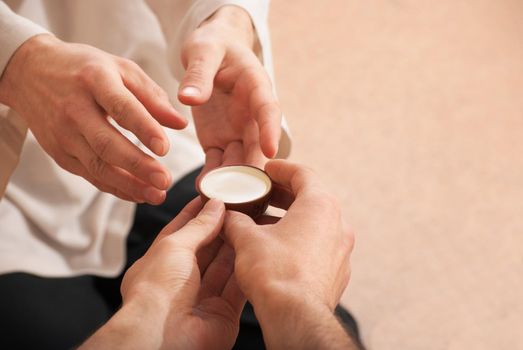 Chinese tea ceremony is perfomed by tea master in kimono