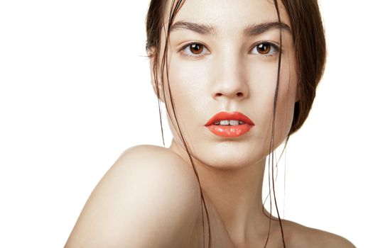 Beautyful woman with wet clear skin over white background