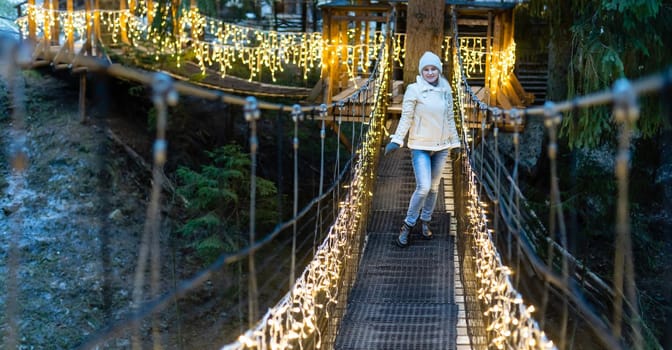 Portrait of happy young woman have fun at beautiful christmas evening.