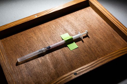 Vaccine ampoule isolated in a box set for injection mixed,Corona virus treatment concept,Covid-19.