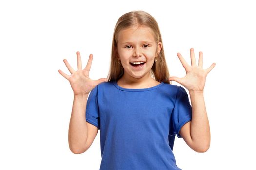 Portrait of adorable little girl isolated on a white background. in blue t-short with long white hair, showing hands