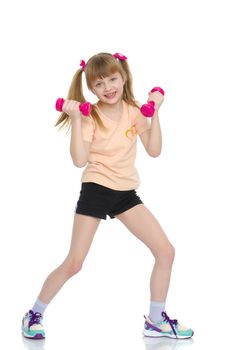 A cute little girl doing exercises with dumbbells. The concept of strength, health and sport. Isolated on white background.