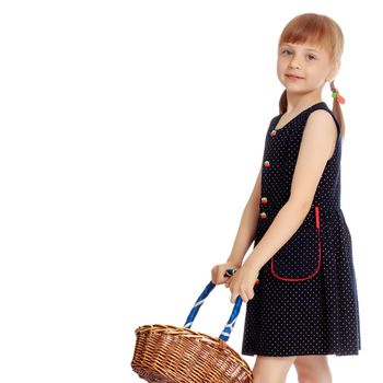 A little girl with a wicker basket made of willow twigs. The concept of family rest, harvesting, picking mushrooms and berries. Isolated over white background