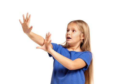 Portrait of adorable little girl isolated on a white background. in blue t-short with long white hair, scared