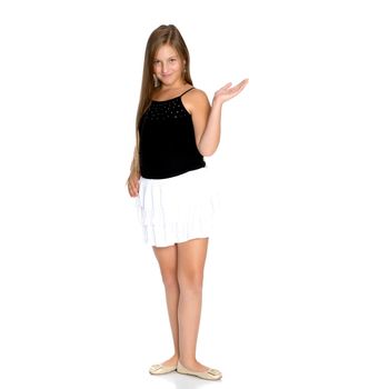 Beautiful teenage girl in full growth on a white background. The concept of youth culture, education and school. Isolated.