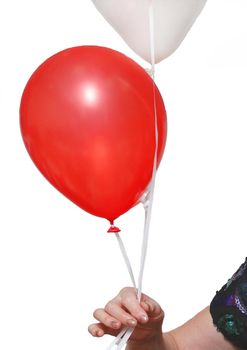 The woman's hand holds 2 balloons on a rope red and light color on a white background, isolated.