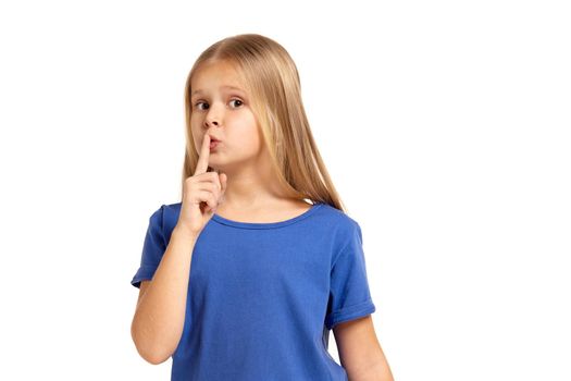 Portrait of adorable little girl isolated on a white background. in blue t-short with long white hair, asking silence