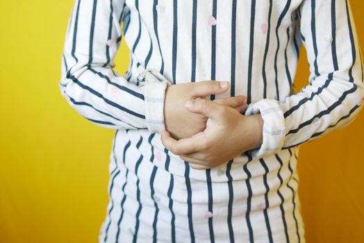 child girl suffering stomach pain close up