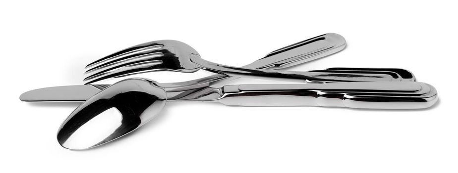 Set of new cutlery isolated on white background close up