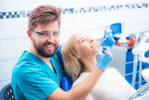 Patient and dentist in the dental office