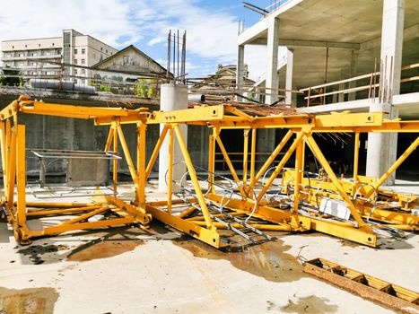 Construction site with concrete and steel and crane lifting equipment