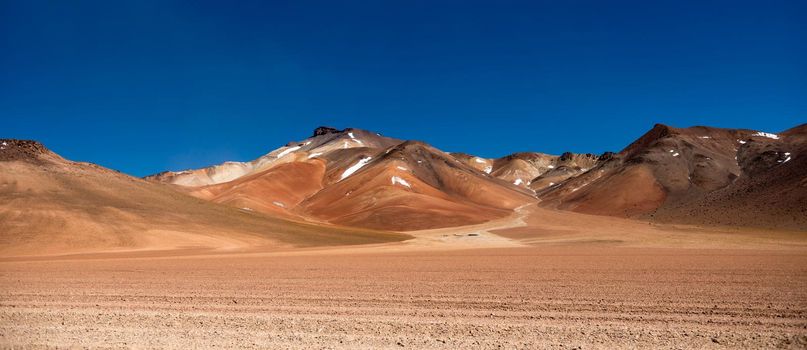 Panoramic view of wide sunshine mountanious Bolivian desert