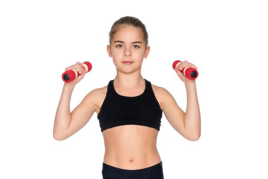 A cute little girl doing exercises with dumbbells. The concept of strength, health and sport. Isolated on white background.