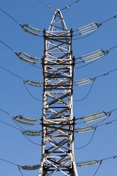 details of power line with blue sky at background