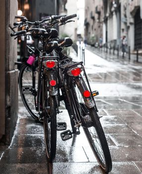 two bicycles in the rain in the Gothic Quarter of Barcelona, ​​Spain