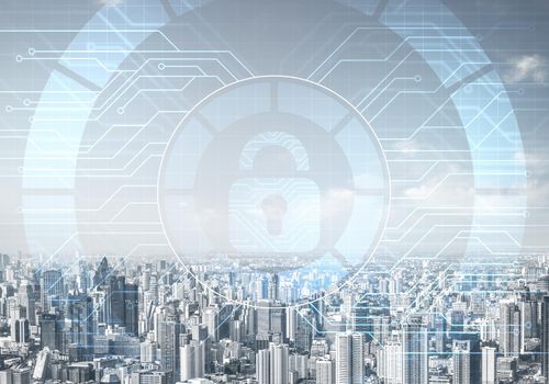 Computer security concept and information technology. Risk management and professional safeguarding. Virtual padlock hologram on background of city skyline. Innovative security solution for business.