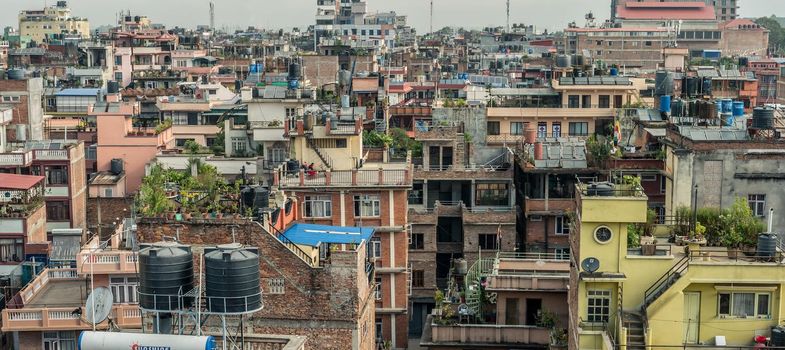 Cityscape of old clolorful multistorey houses in Kathmandu, Nepal. View from rooftop.