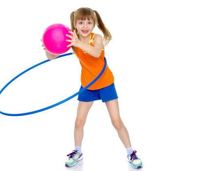 A girl gymnast performs an exercise with a hoop. The concept of gymnastics and fitness. Isolated on white background.