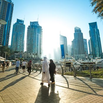 DUBAI, UAE - DECEMBER 14: Modern buildings in Dubai Marina, Dubai, UAE. In the city of artificial channel length of 3 kilometers along the Persian Gulf, taken on 13 December 2013 in Dubai.