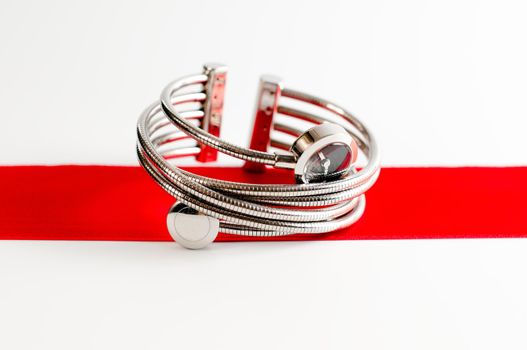 close up photo of femail fashion watches on a red stripe