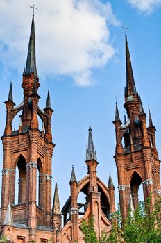 fairy tale, castle like catholic church with blue sky in background