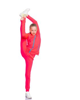 A girl gymnast balances on one leg.The concept of childhood, sport, a healthy lifestyle. Isolated on white background.