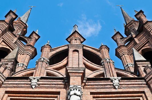 fairy tale, castle like catholic church with blue sky in background