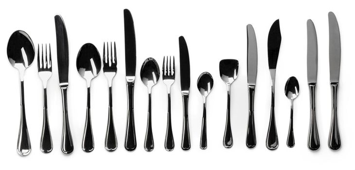 Set of stainless steel cutlery isolated on white background