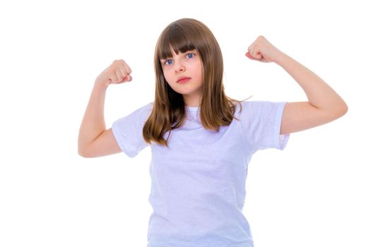 A little girl gymnast joyfully jumps and wags her hands. The concept of sport and fitness. Isolated over white background