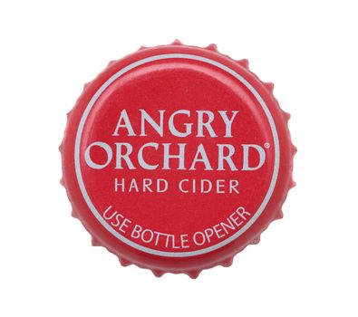 IRVINE, CALIFORNIA - 4 JUNE 2020: Closeup of an Angry Orchard Hard Cider bottle cap on white.