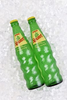 IRVINE, CALIFORNIA - 20 APRIL 2020: Two Bottles of Squirt Citrus Flavored Soft Drink in a bed of ice. Bottled in Mexico. 