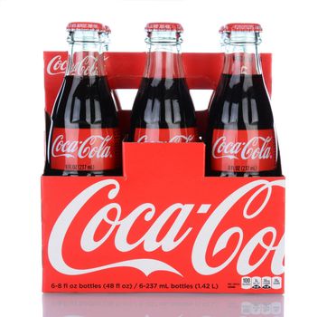 IRVINE, CA - January 29, 2014: A 6pk of Coca-Cola Classic Bottles. Coca-Cola is the one of the worlds favorite carbonated beverages.