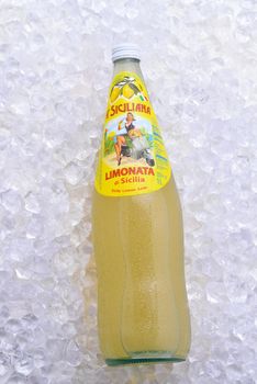 IRVINE, CALIFORNIA - DEC 10, 2018: A  bottle of A Siciliana Limonata, a carbonated lemon soda from Italy, on ice.