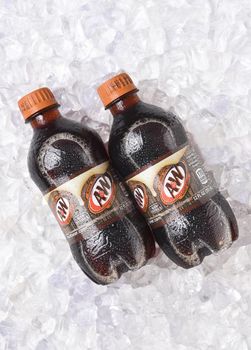 IRVINE, CALIFORNIA - OCTOBER 30, 2017: A&W Root Beer bottles on ice. Owned by Dr Pepper Snapple Group and distributed by the Coca-Cola Company in the USA.