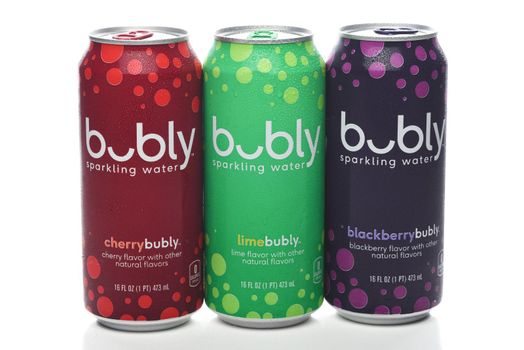 IRVINE, CALIFORNIA - 20 APRIL 2020: Three cans of Bubly Flavored Sparkling Water - Lime, Cherry and Blackberry isolated on white.