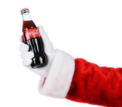 IRVINE, CA - DECEMBER 12, 2014: Santa Claus holding a bottle of Coca-Cola Classic. Coca-Cola is the one of the worlds favorite carbonated beverages.