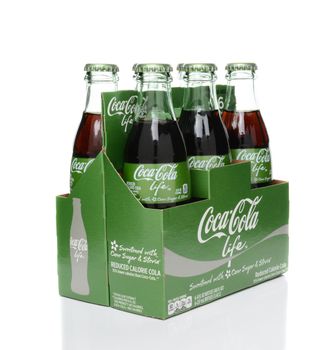 IRVINE, CA - FEBRUARY 15, 2015: 6 pack of Coca-Cola Life bottles. A reduced calorie soft drink sweetened with cane sugar and Stevia, containing 60% of the calories of Classic Coke. 